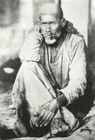 Baba Sitting in Front of Dhuni Maa