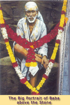 THE BIG PORTRAIT OF BABA ABOVE THE STONE